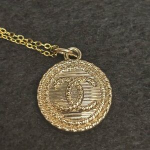 CHANEL Gold-Tone Embossed Double C Rope Medallion Necklace, Upcycled 18 in